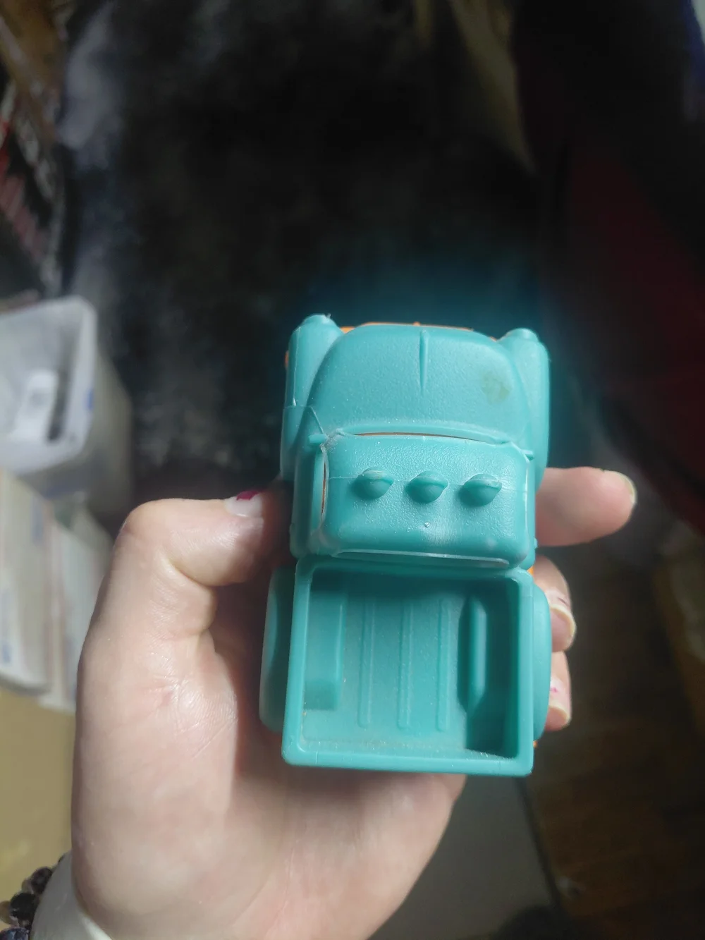 toy is a pickup truck from the B. toys Happy Cruisers collection